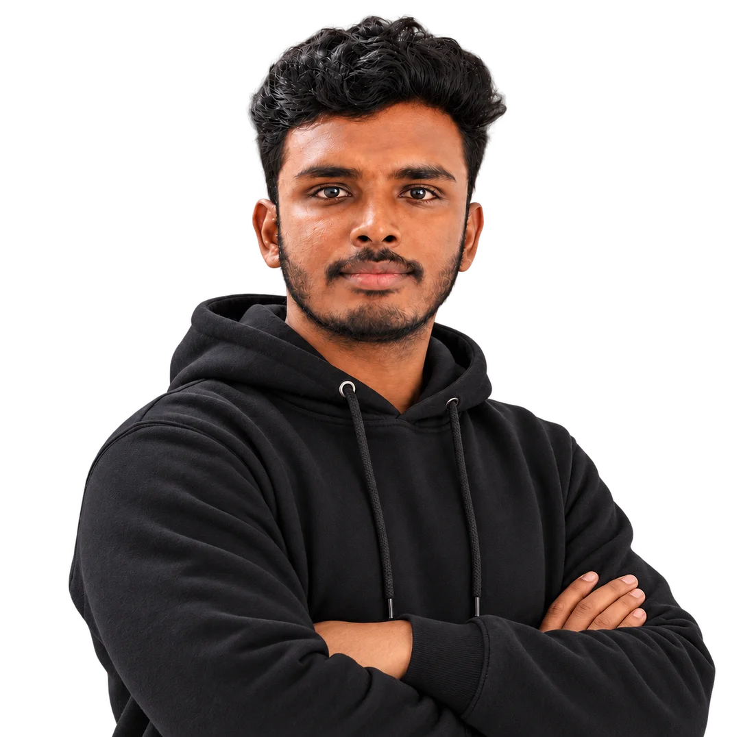Rajesh Kumar in a black hoodie, with arms crossed